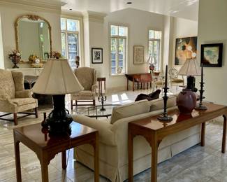 View of the living room with pair of bronze Asian lamps.