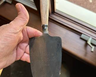 Tiffany & Co. sterling silver wooden-handle trowel. Monogrammed. 