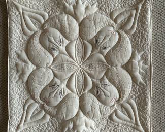'Bleeding Heart' by Elizabeth Gurrier (1930 - 2011). Pictured one square pillow case. Set includes a queen-size quilt, four square pillow cases, and a long pillow case. Executed in 1982. Similar examples found in the
Smithsonian American Art Museum and Renwick Gallery collection.