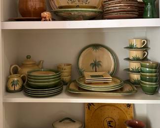 Multiple pieces of pottery, including parcial dinner sets, purchased in Provence.