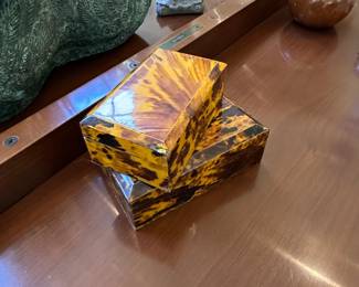 Tortoise shell boxes.
