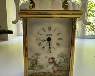 Porcelain and brass carriage clock by Spode. One of at least two with different decorations. 