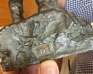Foundry mark on "Niña con Perrito" by Juan Clara