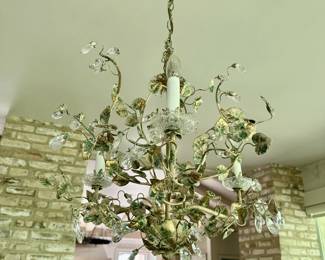 A view towards the kitchen with Italian tole floral chandelier