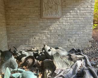 'Omnia Vincit Amor' or 'Love Conquers All' plaster plaque, imitating Vicenza stone, by Carlo Marchiori, Italy (b1937).