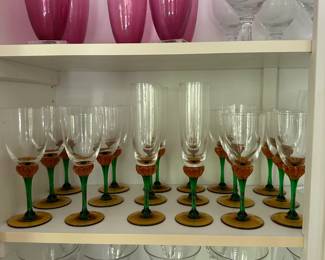 Green and Orange set is by La Rochere France, which is oldest continuously working glass factory in Europe located in the forests of the Lorraine and Franche-Comté regions.
