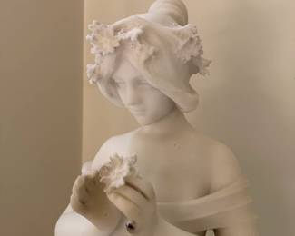 Detail of "Woman Holding Flowers to her Breast."