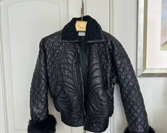 Gianni Versace black lambskin, shearling, and fox jacket.