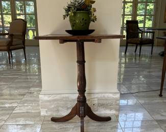 Tripod mahogany table.