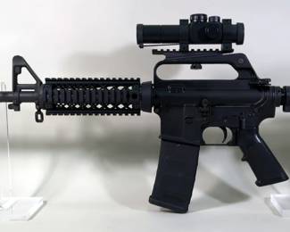 Bushmaster Firearms XM15-E2S 5.56 Nato Rifle SN# L038732, 1/9 H Bar Bbl, Adjustable Stock, 9 Total Mags, Bushnell Trophy Red Dot Sight, Brass Catcher, Vertical Foregrips, Qty 2 (1 Becomes Bipod), Simmons 3-9x40 Scope, Undermount Flashlight, LaserLyte Bore Sighter, Sightmark Bore Sighter, Bipod, Paperwork, And More, In Tactical Soft Case