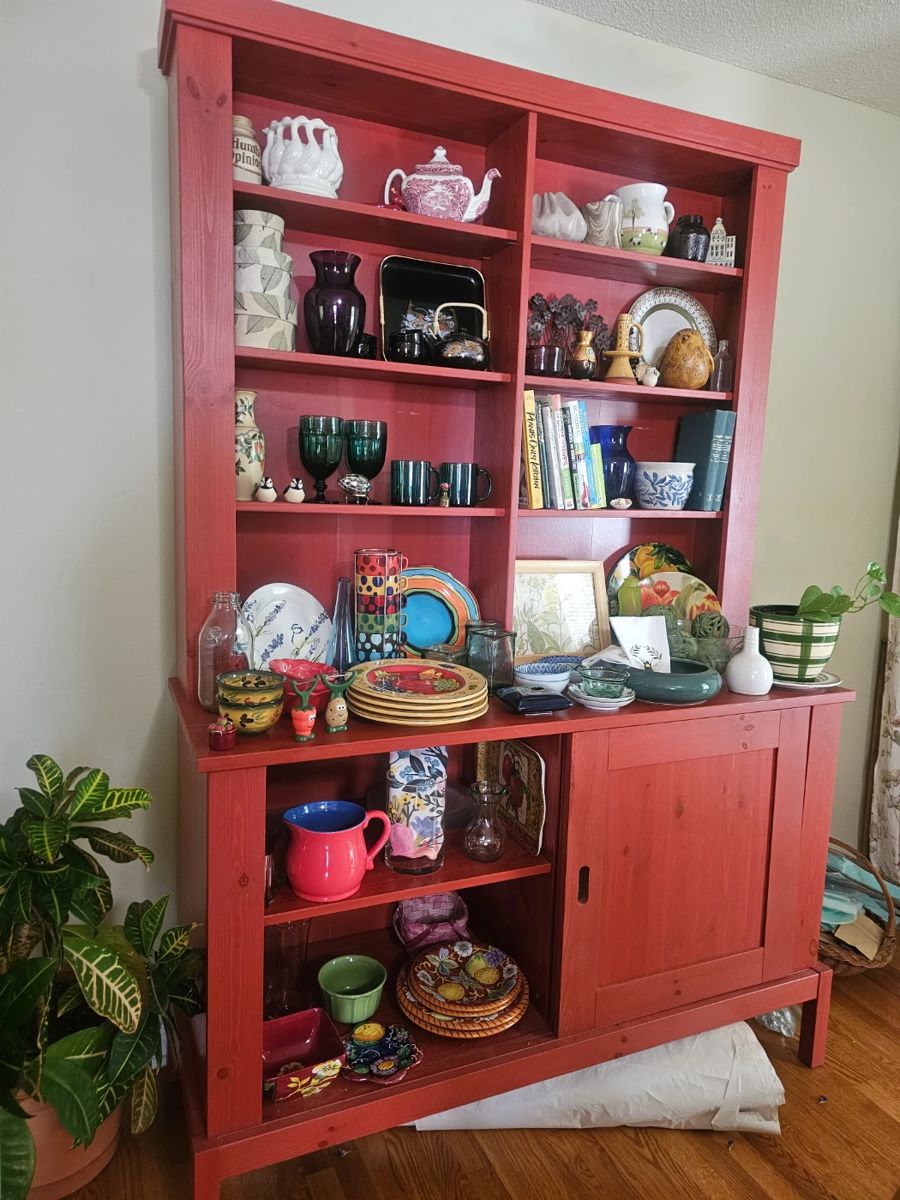Gorgeous red display/storage cabinet! Lots of beautiful home decor
