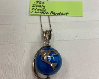 Sterling silver necklace and pendant of the world