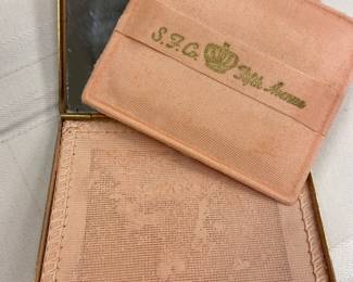 There is still powder in the vintage Saks Fifth Avenue powder compact!