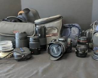 Sony DLSR A100 With Lenses And Light Meter