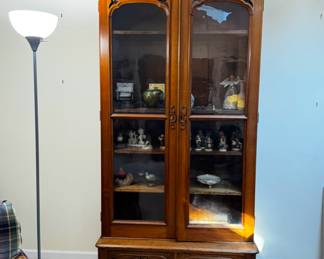 This is an absolutely stunning very, very tall cabinet with beautiful carvings