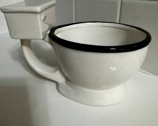 Commode cup