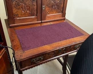 Unusual folk Victorian desk with inlaid doors and butterfly carving