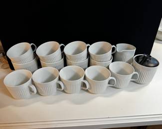 Set of ceramic coffee cups, cream and sugar