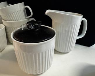 Cream and sugar goes with the various cups along with a beautiful teapot