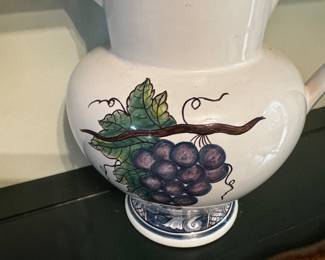 Ceramic pitcher with grape motif