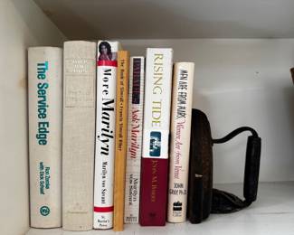 More books, sad iron bookend