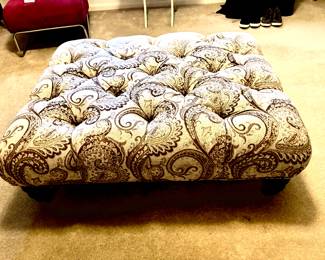Sophisticated tufted ottoman