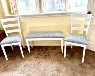 White chairs and matching bench