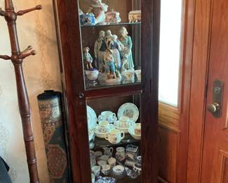 Solid oak coat rack late 1800s display case it holds blue Willow and various music boxes, Nippon pieces