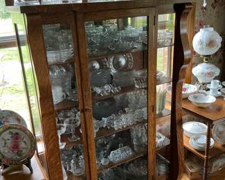 This beautiful little tiger oak piece is for sale. Holds a large collection of cut crystal. This cabinet is on pre-sale it holds a collection of key Greek glassware.