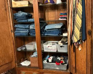 The jeans in this armoire range in size 34/to 38/34