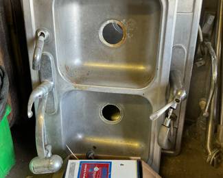 You have three stainless steel sinks, all double-sided