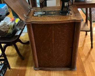 Beautiful black gold, inlay, sewing machine in cabinet from England