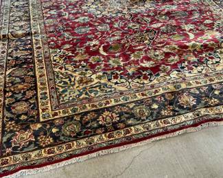 This is a handwoven rug made in Iran in the 30s