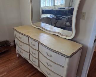 #40	French Provencial Dresser w/9 drawers & Mirror - 59x18x33  Mirror - 46x32  (as is finish)	 $100.00 
