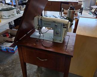 #174	Penncrest SJC Penney Blue Sewing Machine (cord broken) in a cabinet	 $20.00 
