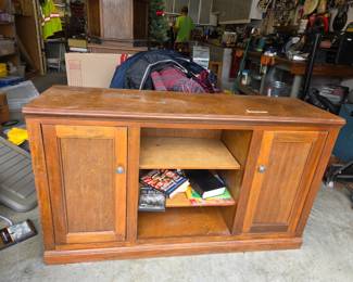 #135	Wood Look Storage Cabinet w/2 doors & 4 shelves - 55x17x32	 $35.00 
