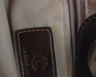 #241	Carryland Cream Bag w/leather Straps	 $20.00 
