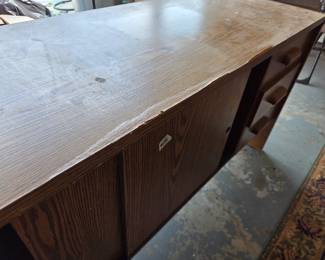 #178	Laminate Credenze w/5 drawers & Sliding Front Door (locks and key) (as is top finish) - 66x20x29.5	 $40.00 

