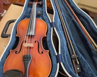 #230	E.R. Pretzschner Violin w/2 bows w/hard Case	 $100.00 
