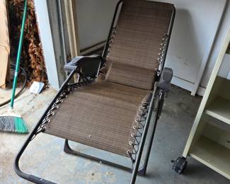#169	Tan/Brown Anti-gravity Chair w/side cup holder & Back Cushion	 $35.00 
