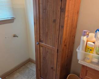 #33	Laminate Wood Panel Look Cabinet w/ 1 door & Shelves - as is needs tightening - 18x16x60.5	 $50.00 
