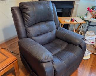 #25	Ashley Furniture Leather Lift Chair electric w/remote (lifts, Foot comes up and Back Reclines)	 $275.00 
