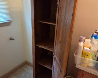 #33	Laminate Wood Panel Look Cabinet w/ 1 door & Shelves - as is needs tightening - 18x16x60.5	 $50.00 
