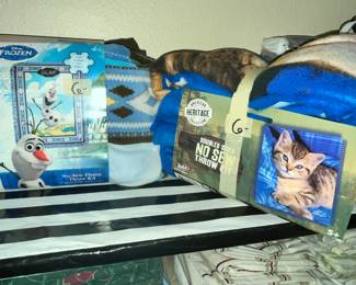SEVERAL NEW-IN-PACKAGE BLANKETS
