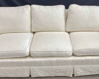 Cream Colored Upholstered Sofa W Damask Style Pattern