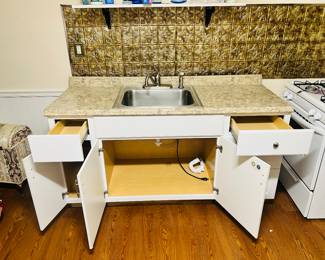 Kitchen countertop, sink, faucet, three cabinet units together with drawers total size 24 depth x 66 length. This is already built and ready for install - perfect for apartment, in-law suite, basement or contractor 