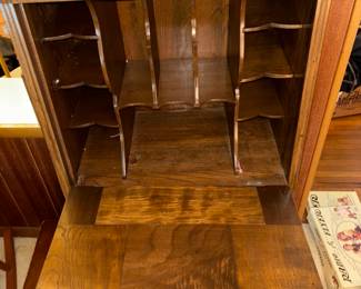Interior pigeon holes of the drop front writing desk 