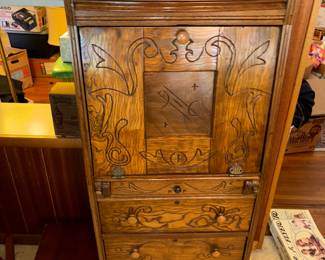 Carved drop front desk with storage 