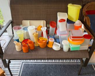 More Tupperware atop patio glider 