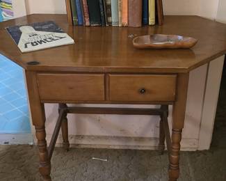 This is a corner desk with 2 drawers